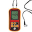 Front view of the handheld thickness gauge, sound velocity display and connected ultrasonic probe