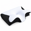 A contoured neck pillow with a white quilted top surface and black textured side panels, shown on a clean white background.