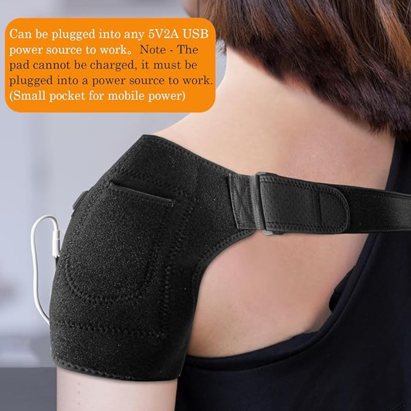 Black shoulder brace worn by a person with text on USB compatibility.