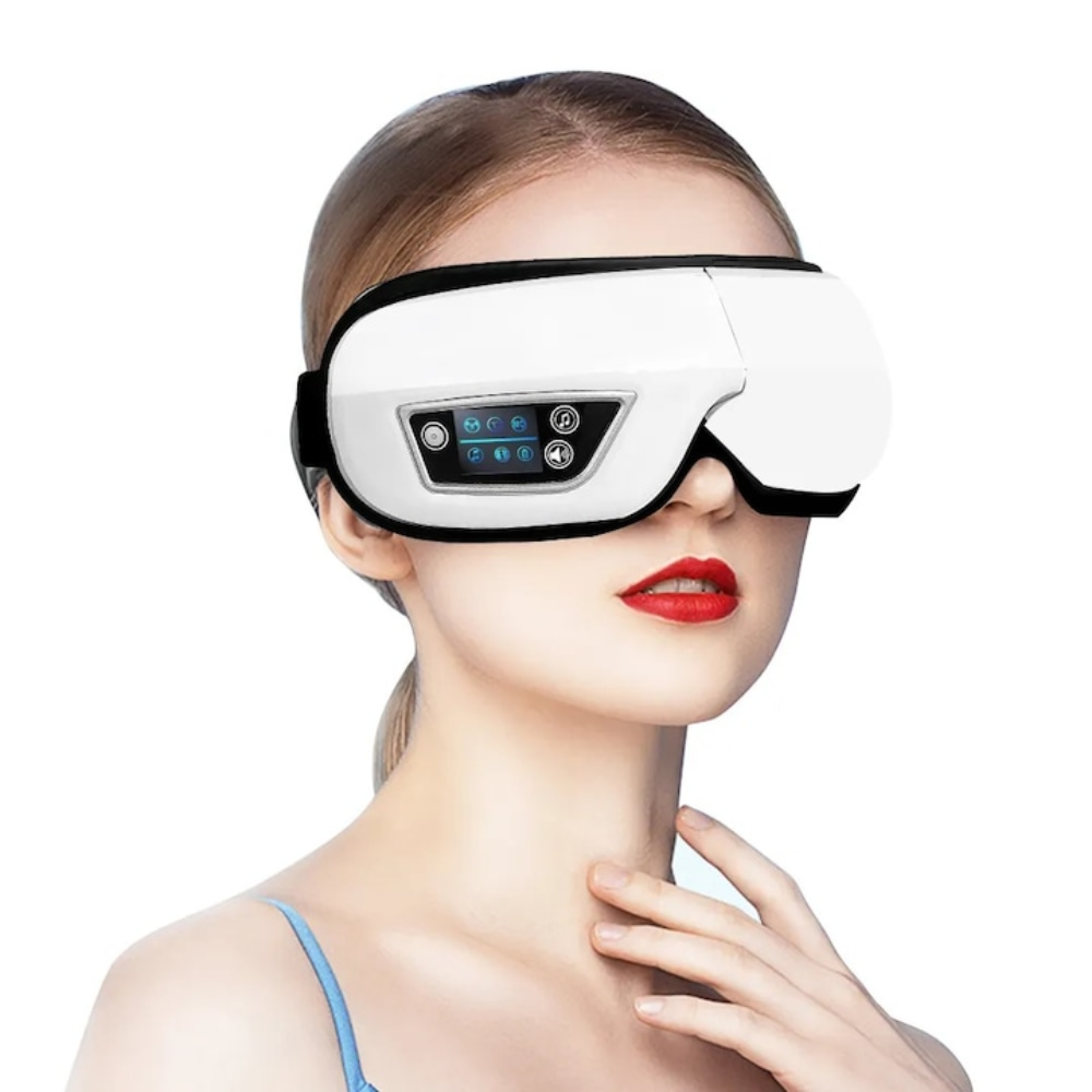A woman wearing a white and black electronic eye mask with a digital control panel, shown against a plain white background.