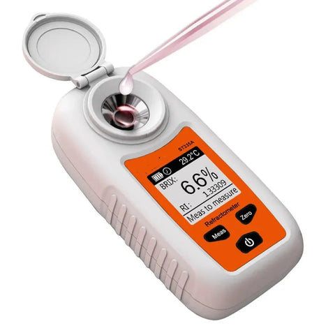 Digital Brix refractometer with open protective cover and sample dropper on a clean white background