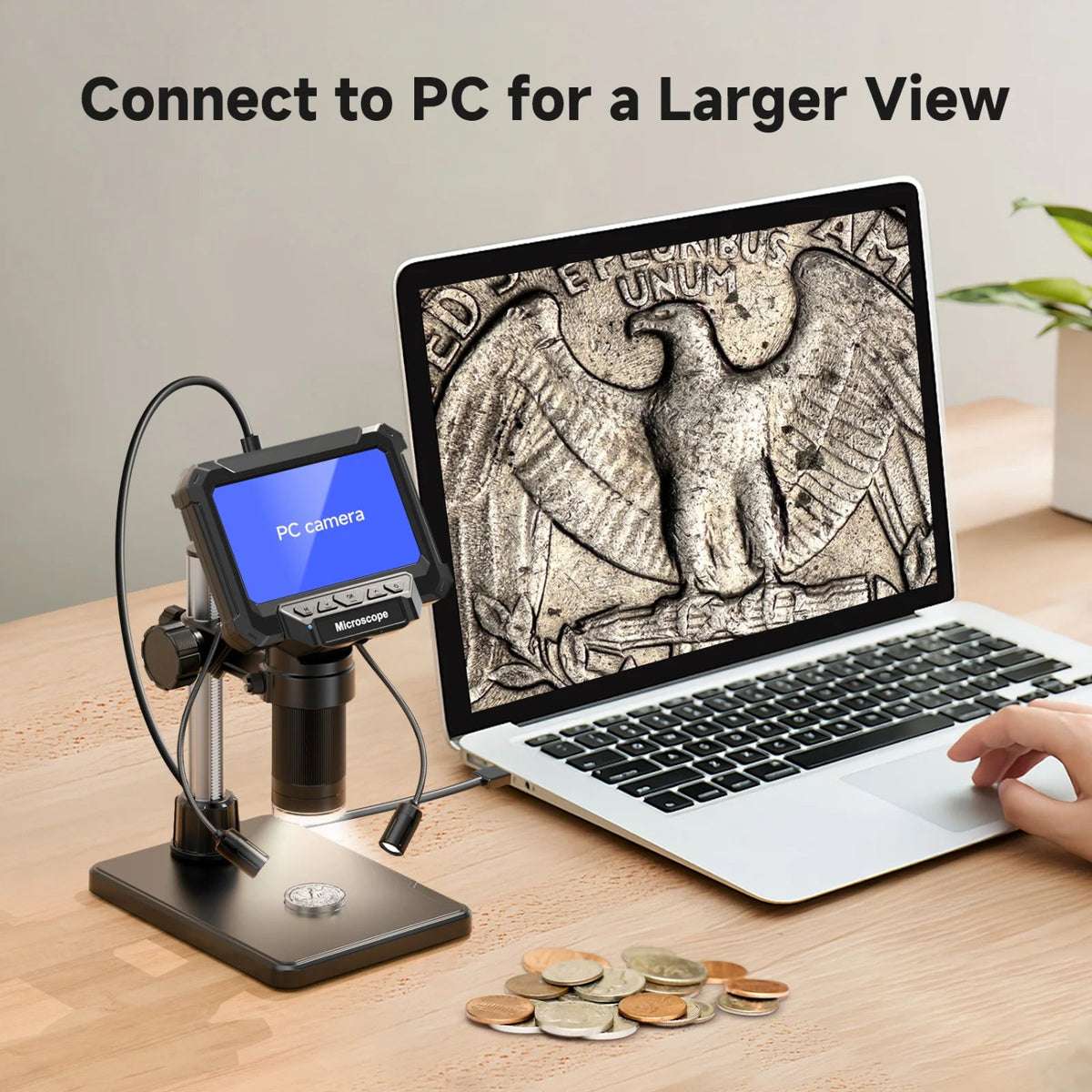 Digital microscope connected by USB to a computer for viewing a coin on a larger screen.