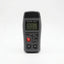 Digital wood moisture meter with protective pin cap and LCD percentage display on a white background.
