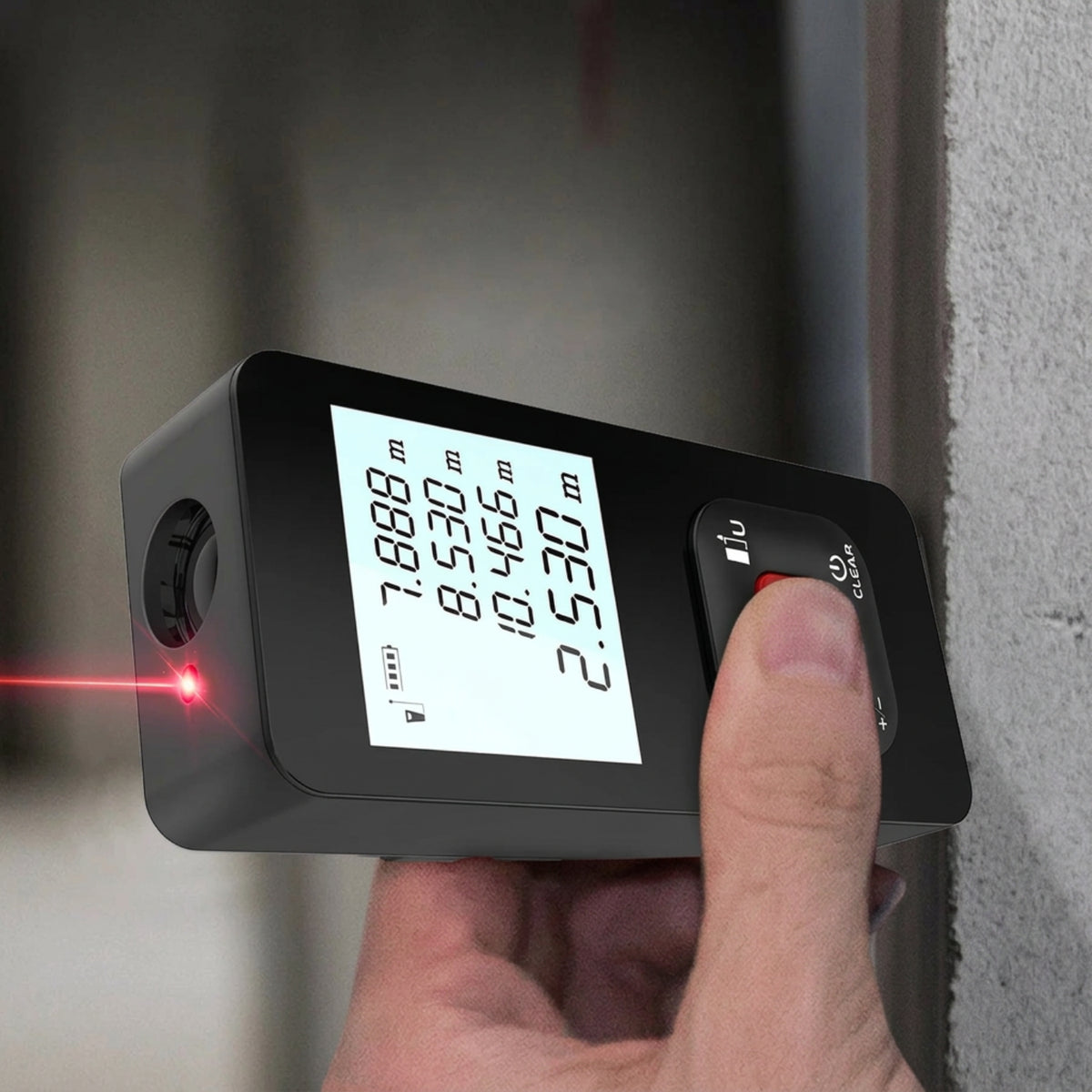 Illustration of a handheld laser distance meter taking a measurement against a wall
