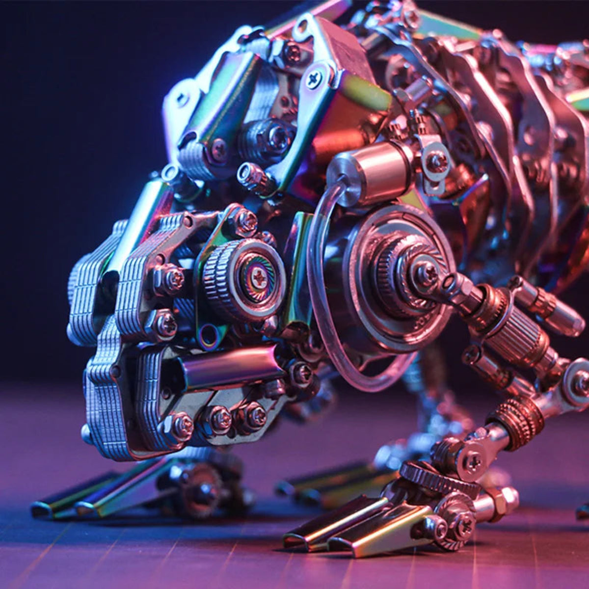 Close-up of the mechanical chameleon head, layered metal plates, gears and front foot