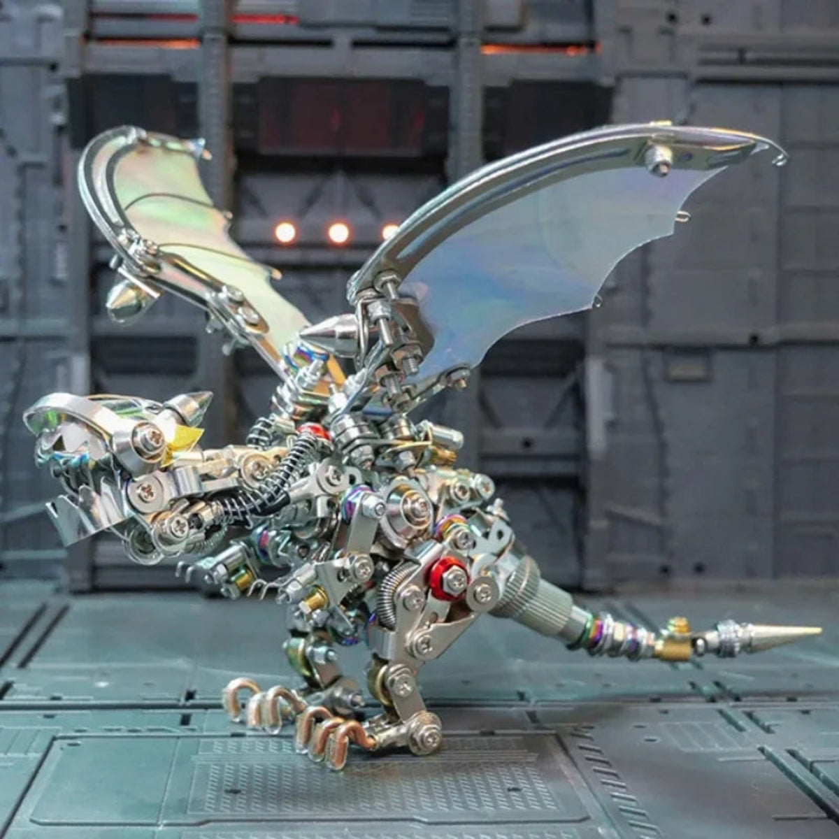 Mechanical dragon metal model in a science-fiction display setting with its wings raised