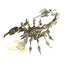 Assembled gold-and-silver mechanical scorpion metal model on a white background