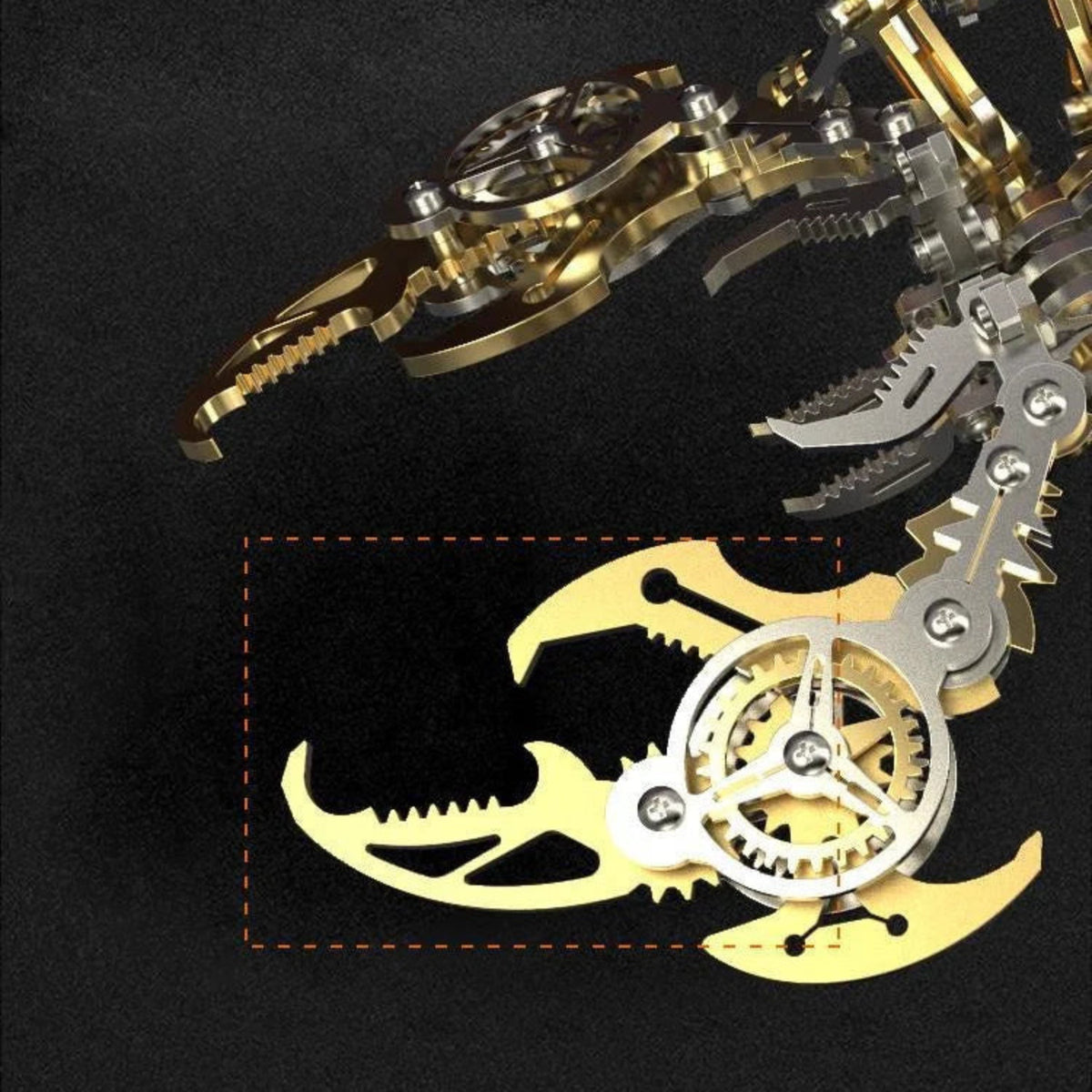 Close-up of the gold-and-silver scorpion model showing the layered claw and metal fasteners