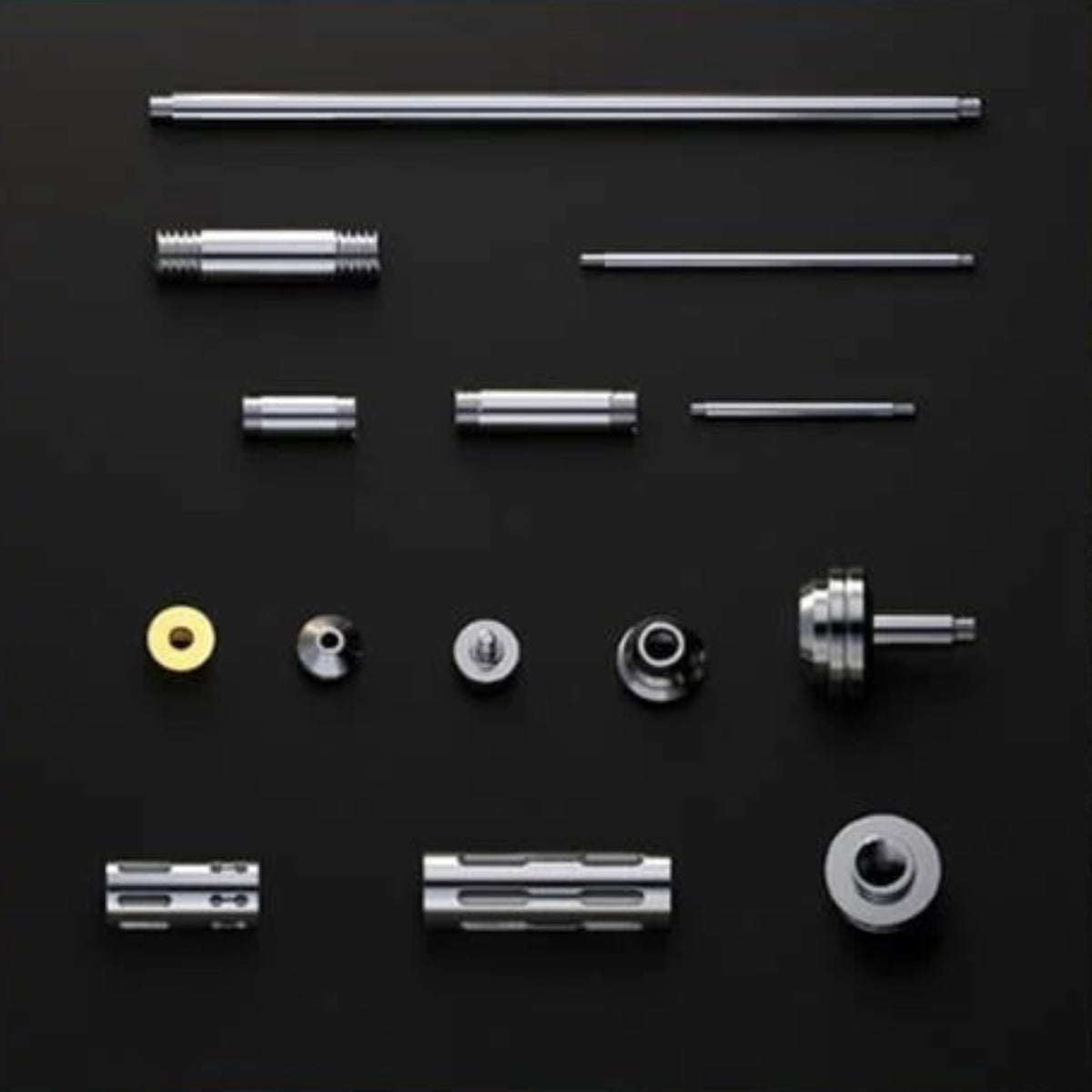 Selection of screws, spacers, sleeves and metal fasteners used to assemble the scorpion model