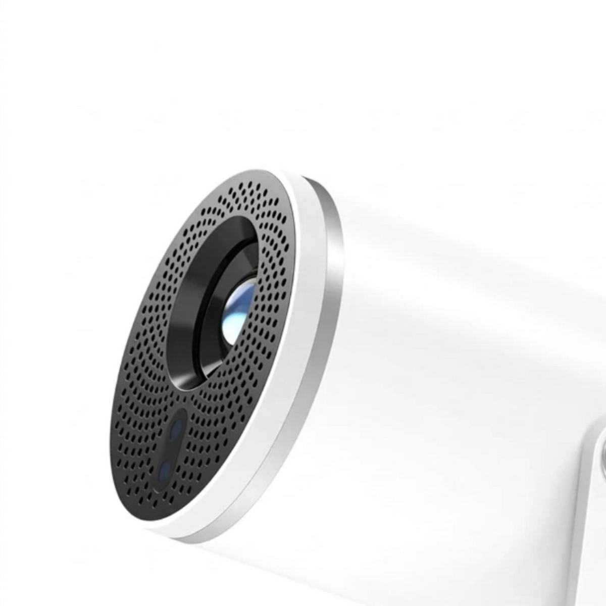 Close-up of the Full HD projector lens and perforated front grille.