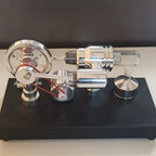 Top view of the Stirling engine flywheel, connecting linkage, generator and digital voltmeter