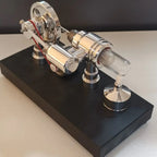 Rear angle of the polished Stirling engine with generator, burner and black display base